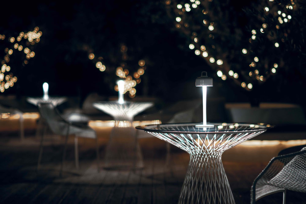 Furnishing and lighting an outdoor hospitality space