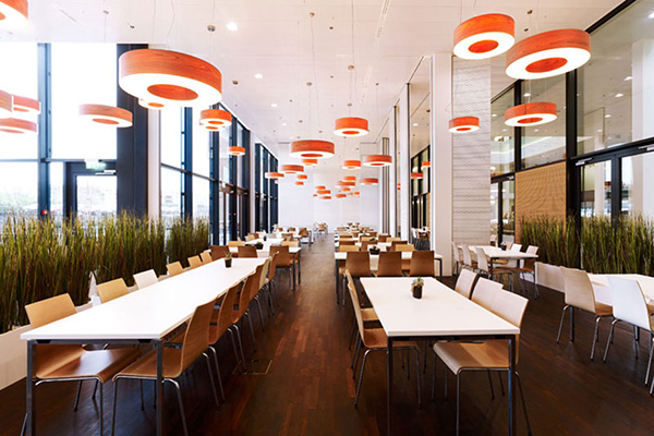 LZF Lamps’ Saturnia suspension in Bison Restaurant, Switzerland.  Image courtesy LZF Lamps. 